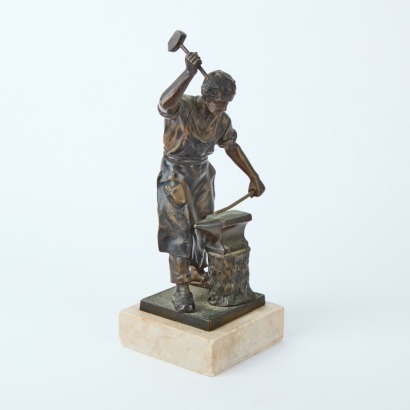 A Bronze form on A Marble Base