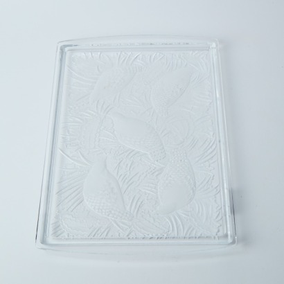 A Glass Tray With Tuis