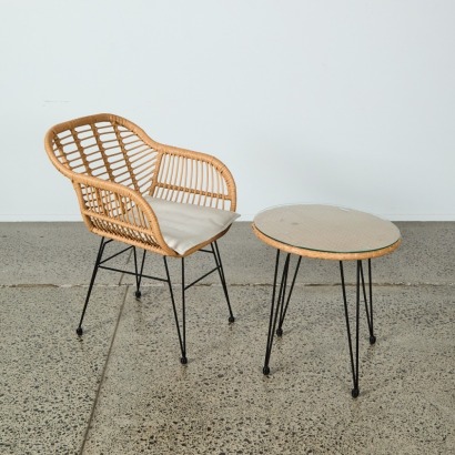 A Bistro Setting Chair and Table