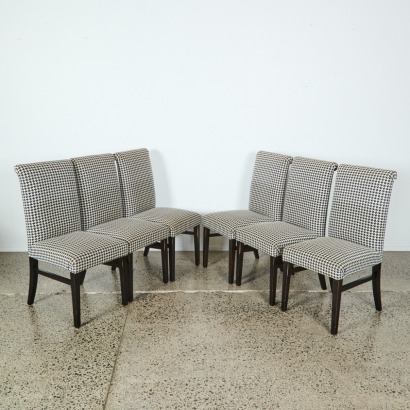 A Set of Six Houndstooth Dining Chairs