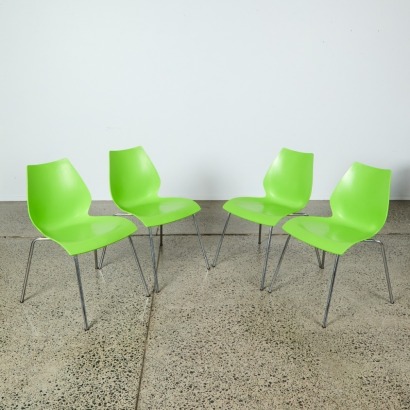 A Set of Four Kartell Maui Chairs in Green