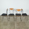 A Wrought Iron and Glass Bistro Table and Four Rattan Chairs - 2