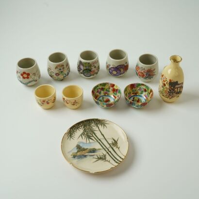 A Group of Eleven Japanese Satsuma Ware Sake Cups and Dishes (Damaged)