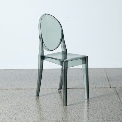 A Smoky Grey Ghost Style Chair