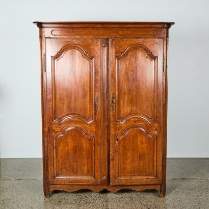 A French Cherrywood Armoire, c. 18th Century
