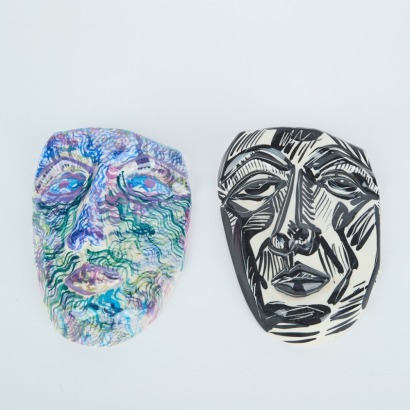 A Pair of 1990 Pottery Faces