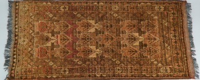 A Small Wool Hand Knotted Afghan Mat