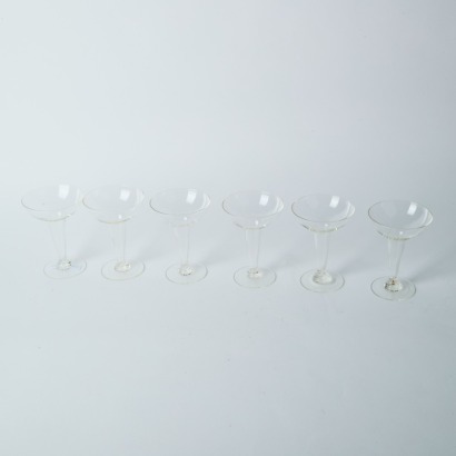 A Set of Six Hollow Stem Champagne Glasses
