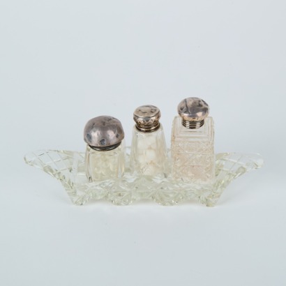 A Set of Three Sterling Silver Topped Containers With Tray