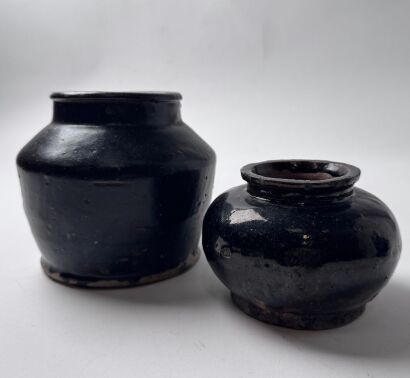 A Set of Two Asian Brown-glazed Pottery Jars
