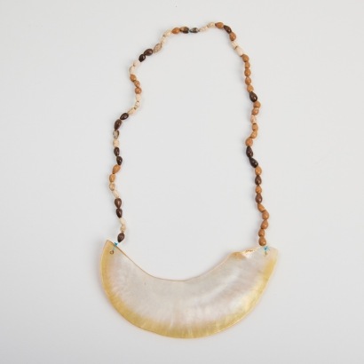 A Kina Shell Neck Ornament, Papua New Guinea