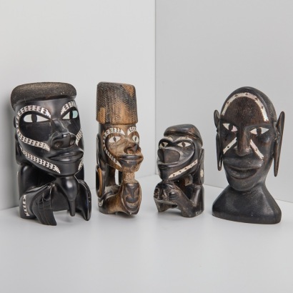A Collection of Four Hardwood Mother of Pearl Carvings, Solomon Islands