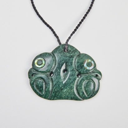 A Contemporary Pekapeka Pendant with Paua Inlay