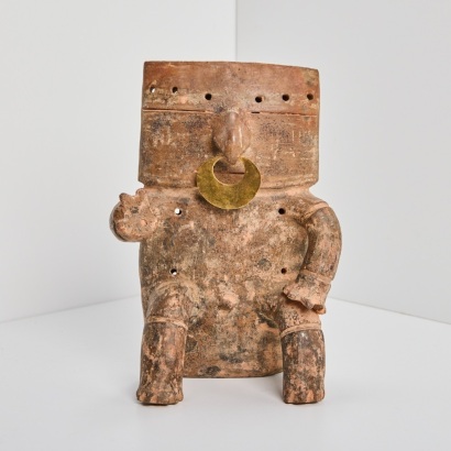 A Quimbaya Pottery Seated Slab Figure, Colombia