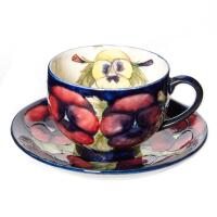 William Moorcroft, Pansy Cup and Saucer, C.1920