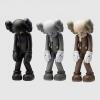 A Trio of KAWS Small Lie