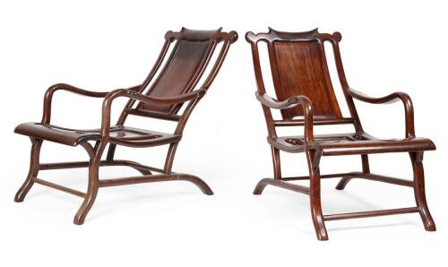 A Pair of Chinese Blackwood Reclining Chairs (one arm repaired)