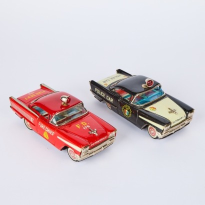 A Pair of Oldsmobile Fire and Police Chief Cars