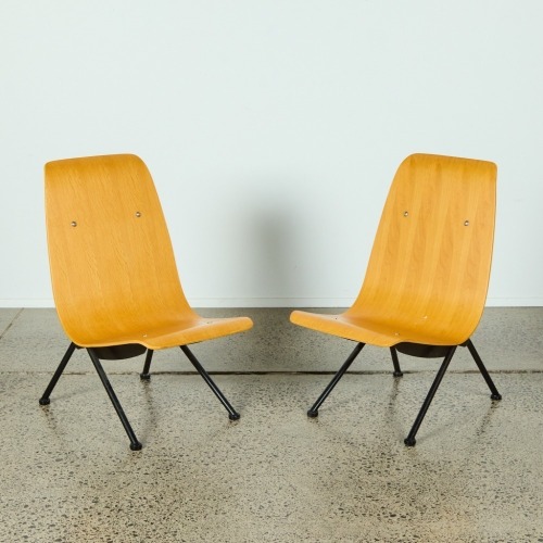 A Pair of Ply Chairs in the Style of Jean Prouve