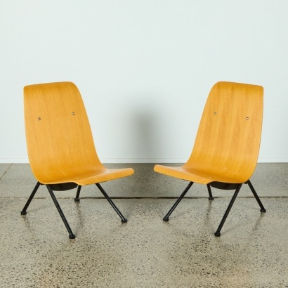 A Pair of Ply Chairs in the Style of Jean Prouve