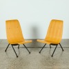 A Pair of Ply Chairs in the Style of Jean Prouve