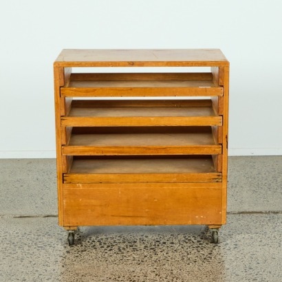 A Vintage Solid Wood Storage Unit on Castors