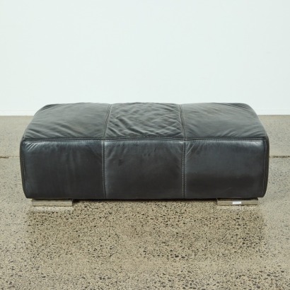 A Black Leather Ottoman