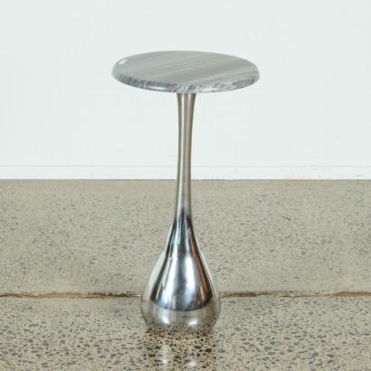 A Polished Granite Side Table