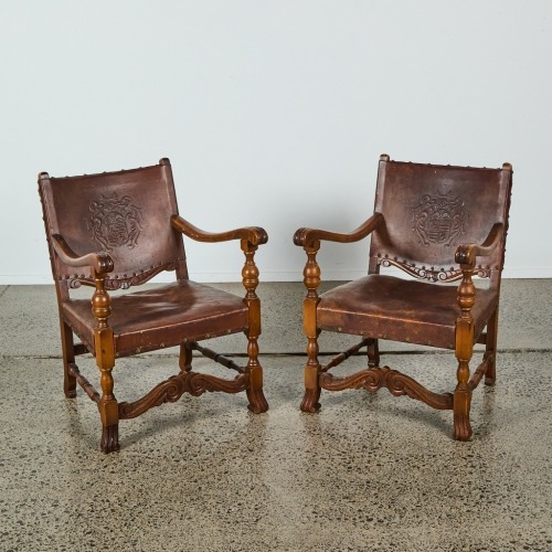 A Pair of Oak and Leather Arm Chairs c. 19th Century