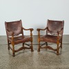 A Pair of Oak and Leather Arm Chairs c. 19th Century