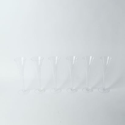 A Set Of Six Hollow Stemmed Champagne Coupes