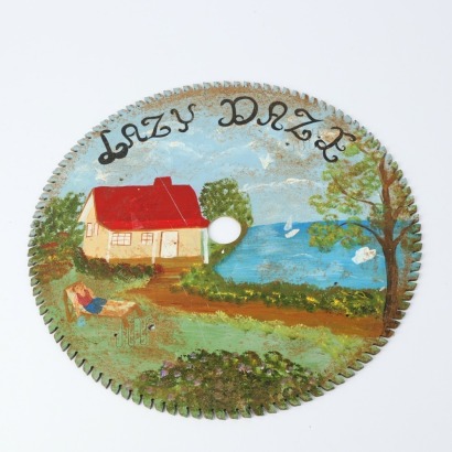 A Folk Art 'Lazy Daze' Painted Saw Blade