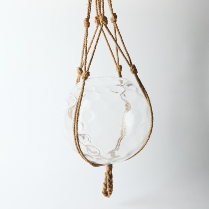 A Hanging Macrame and Large Glass Bowl