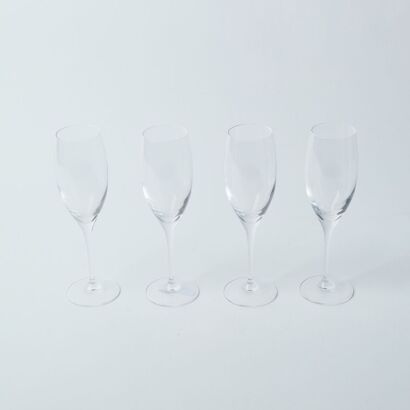 A Set of Four Riedel Champagne Glasses