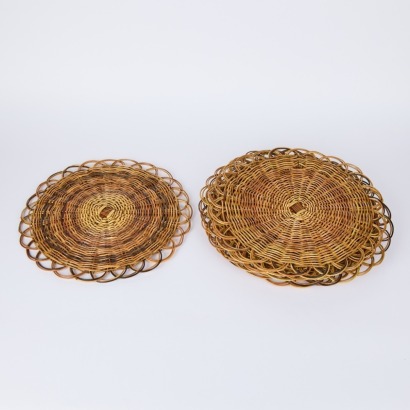 A Set of Six Woven Rattan Placemats