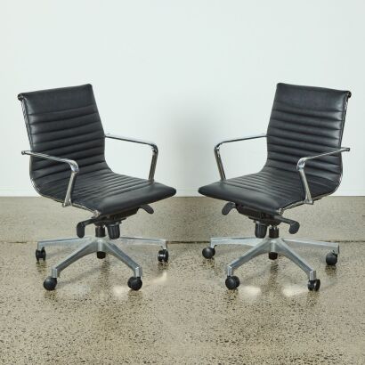 A Pair of Eames Replica Office Chairs