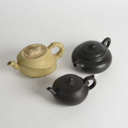 A Group of Three Chinese Purple Clay Teapots