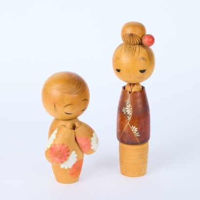 A Pair of Kokeshi Dolls A/F