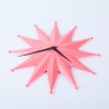 A Pink MCM Starburst Clock