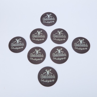 A Set of Eight Vintage Natural Slate Glenfiddich Scotch Whisky Coasters