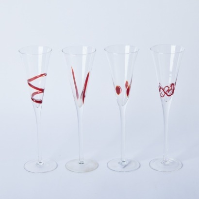 A Set of Four Hand-Blown Flutes with Red Accents