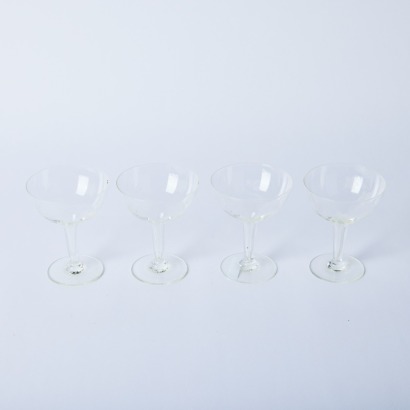 A Set of Four Vintage Hollow Stemmed Champagne Glasses