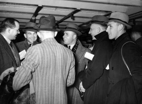 Springboks chat on deck of Wanganella: M.M. ("Boy") Louw, J.W. Lotz, J.A. Broodryk, L.C. Strachan, J. Bester and G.H. Brand