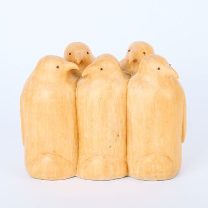 A Wooden Cluster of Penguins