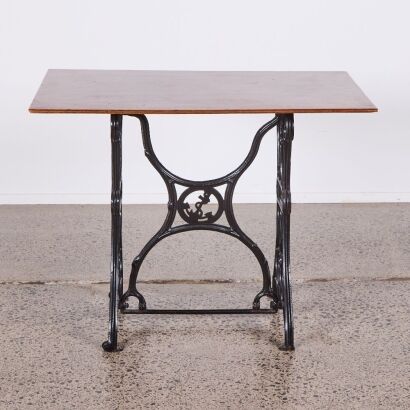 A Vintage Desk with Cast Iron Base