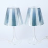 A Pair of Philippe Stark Miss K Lamps