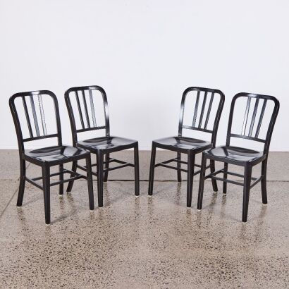 A Set Of Four 1006 Navy Replica Chairs