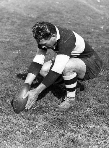 George Nepia practising kicking at goal