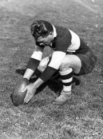 George Nepia practising kicking at goal