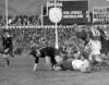 Number 17, C. B. Jennings of South watches as Arthur Lambourn (New Zealand) tackles un-identfied South African player